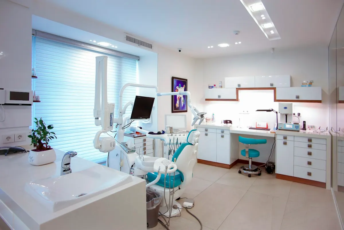 Illustrative dental treatment room with chair and equipment